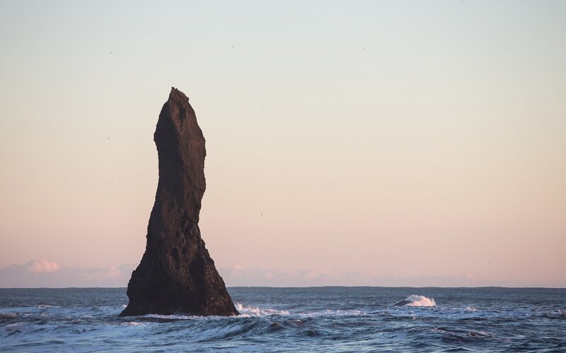 Solitary sea stack at sunset