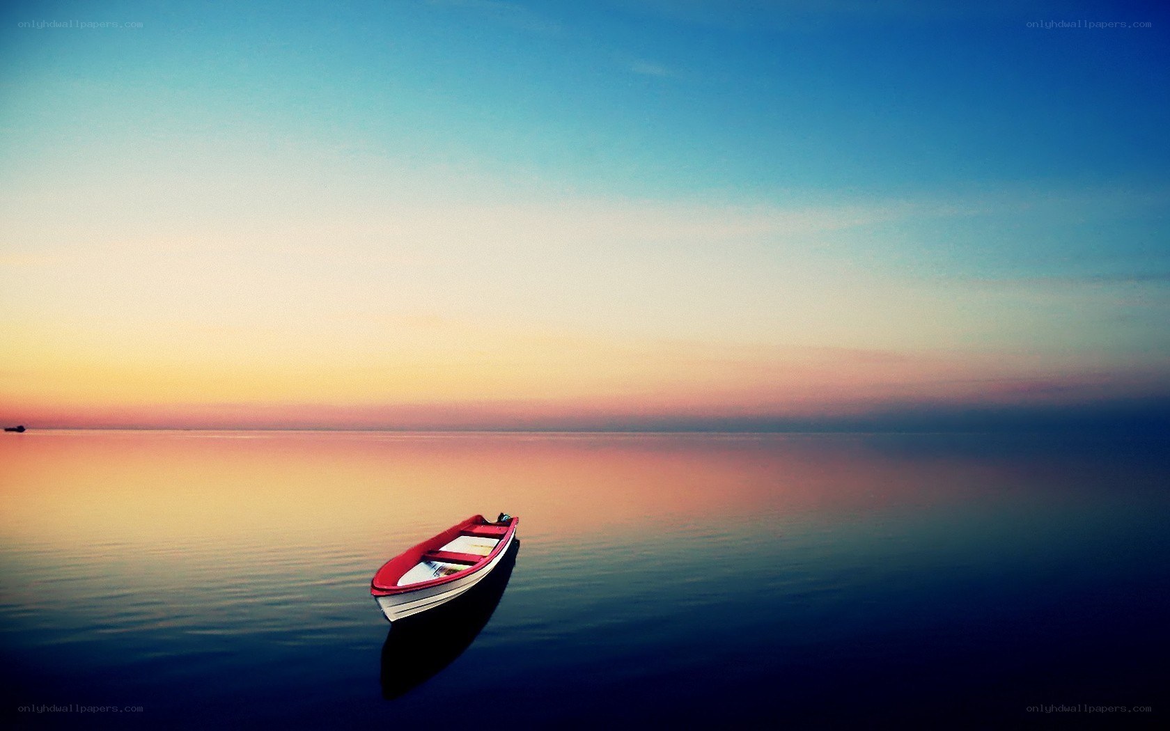 Solo boat at sunset