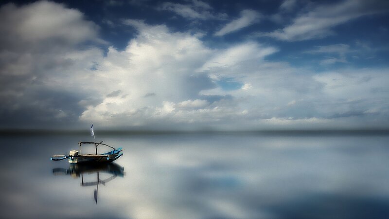 Solo boat on calm water