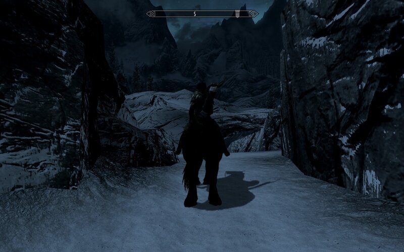 solo rider in snowy pass