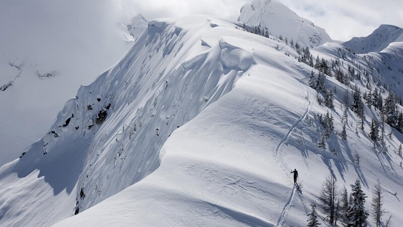 Solo skier on snowy mountain