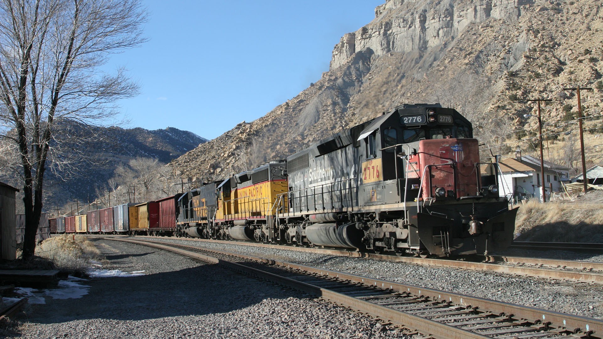 Southern Pacific train in mountain pass