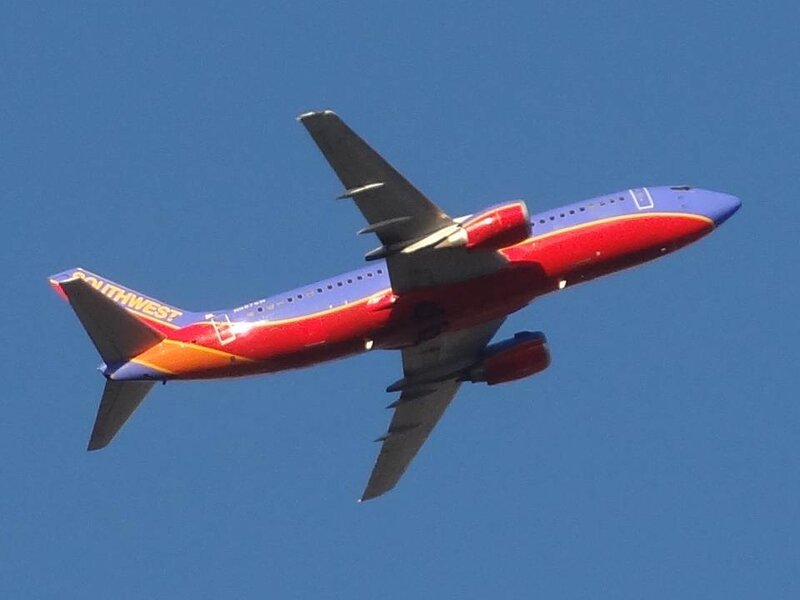 Southwest Airlines Plane — Blue, Clear, Afternoon, Photograph, Airplane
