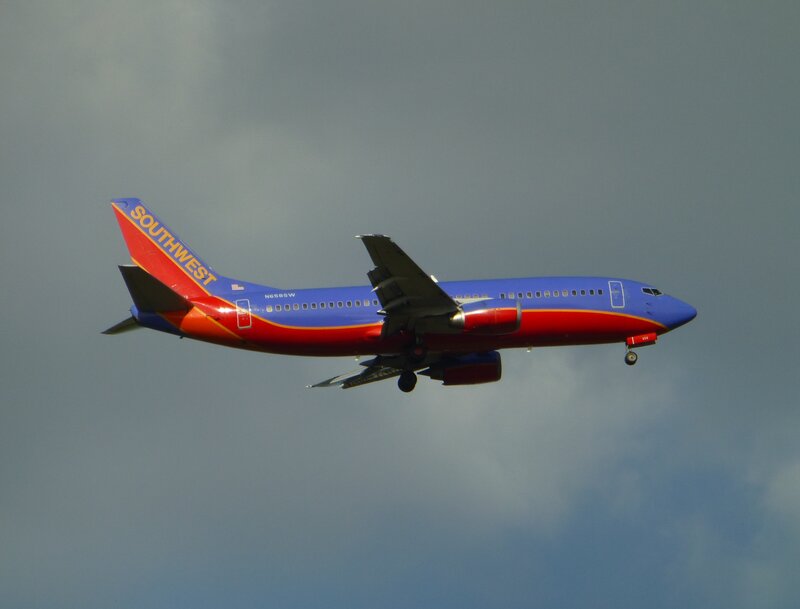 Southwest Airlines Plane — Blue, Dramatic, Photograph