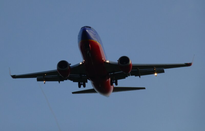 Southwest Airlines Plane — Blue, Dramatic, Sunset, Photograph