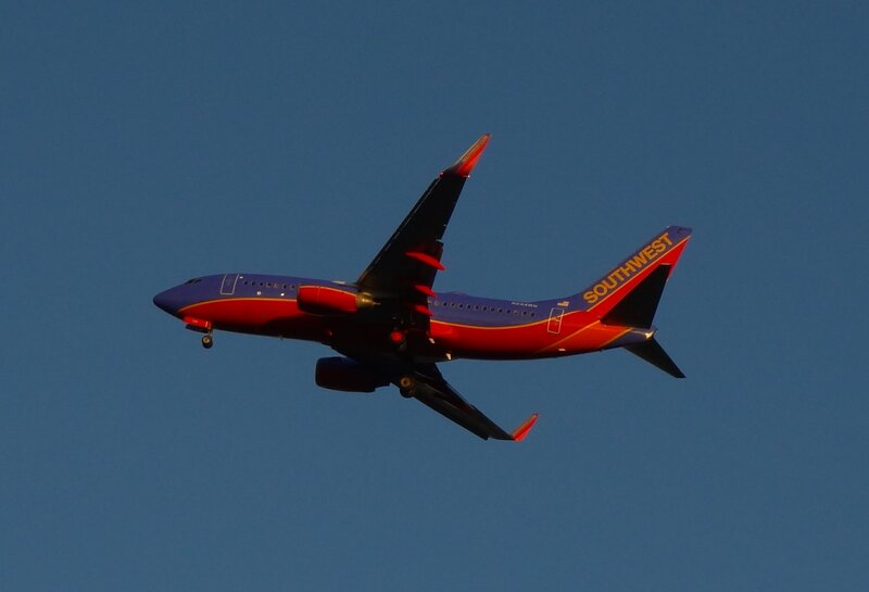 Southwest Airlines Plane — Blue, Dramatic, Sunset