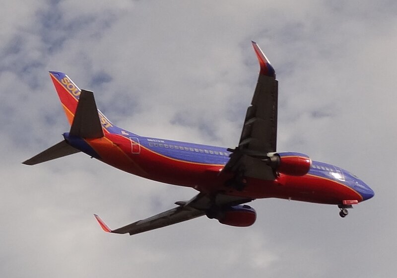Southwest Airlines Plane — Red, Dynamic, Photograph, Airplane, Sky