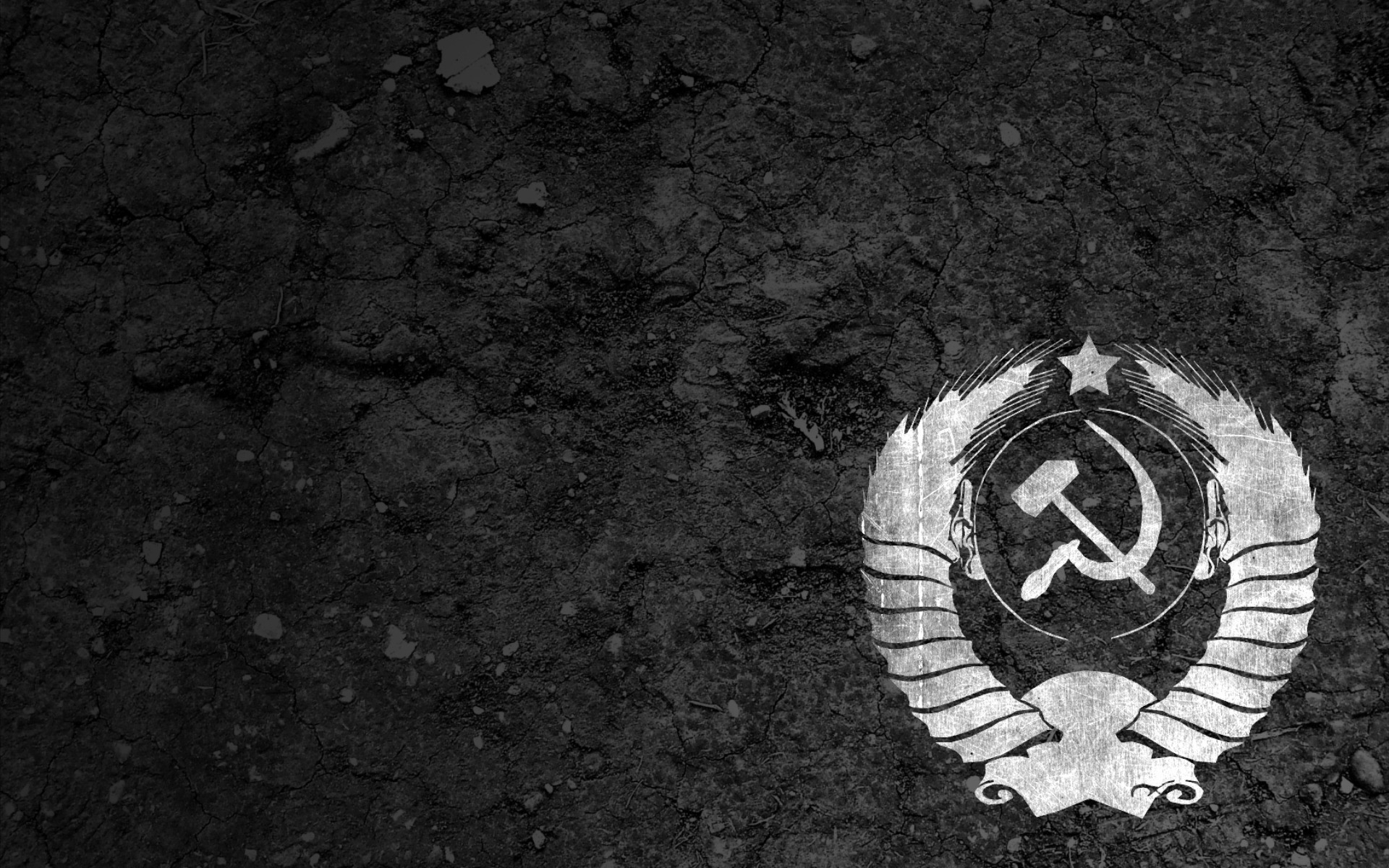 Soviet emblem on cracked earth