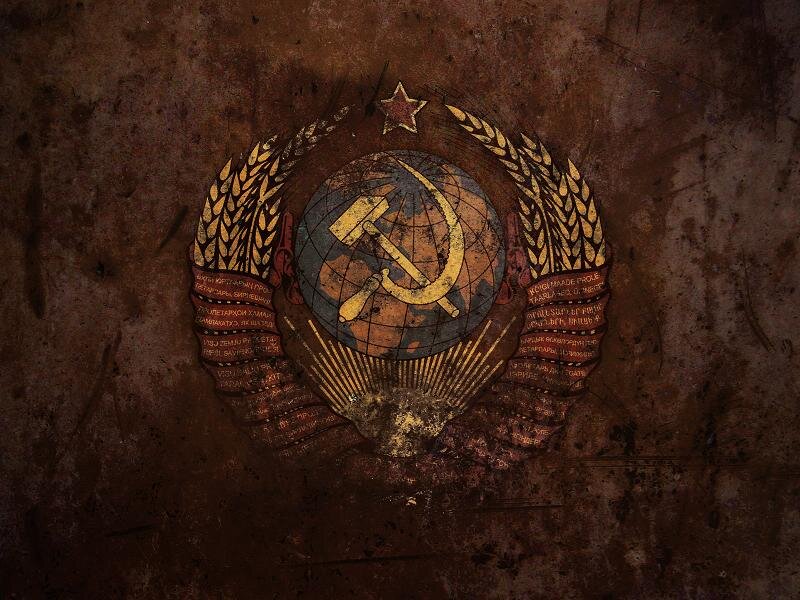 Soviet emblem on rusted surface