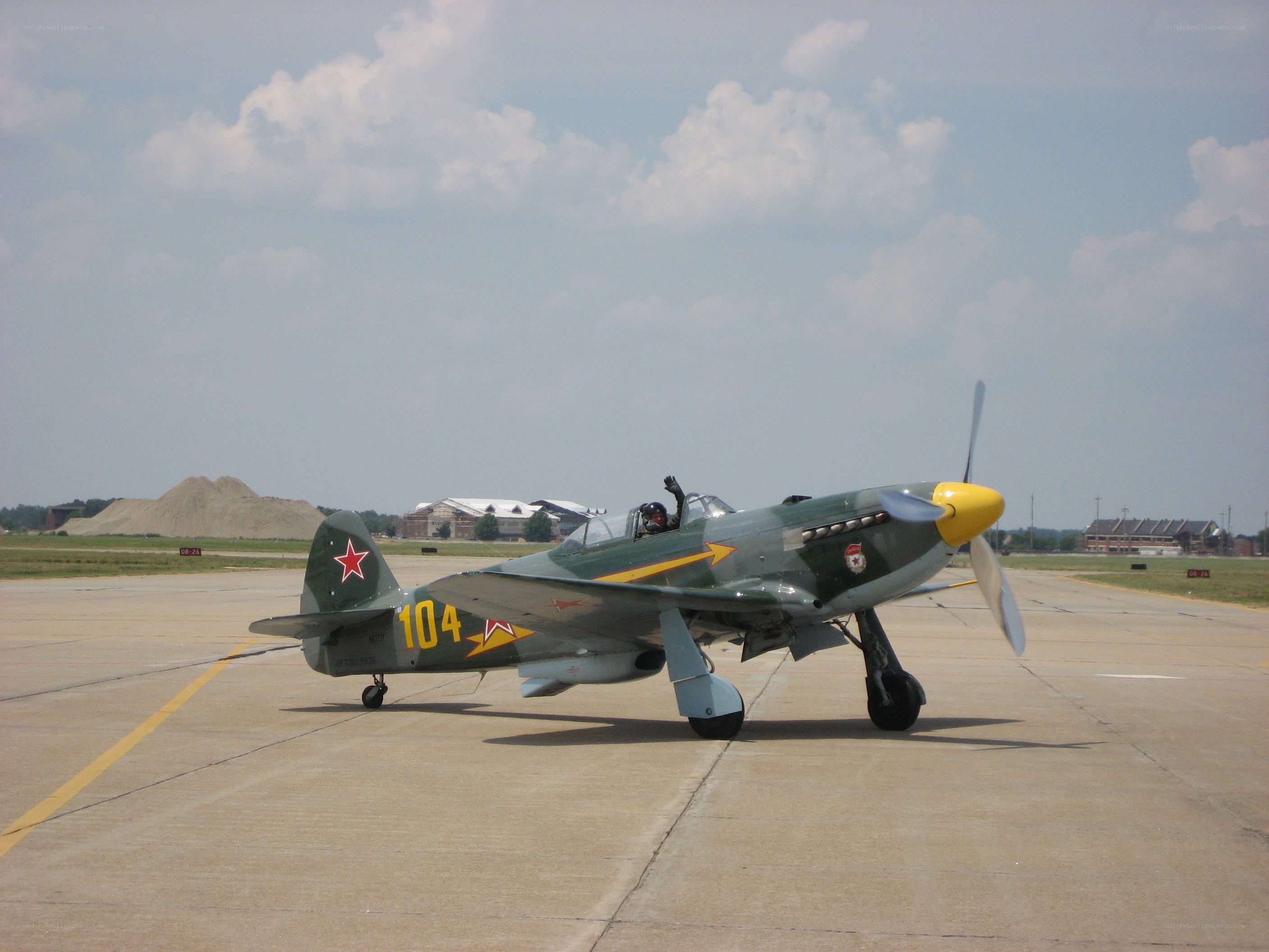 Soviet-era fighter plane on tarmac