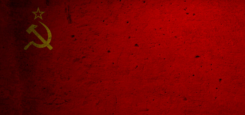 Soviet flag on red wall