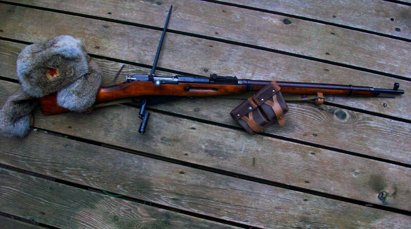 Soviet rifle with fur hat