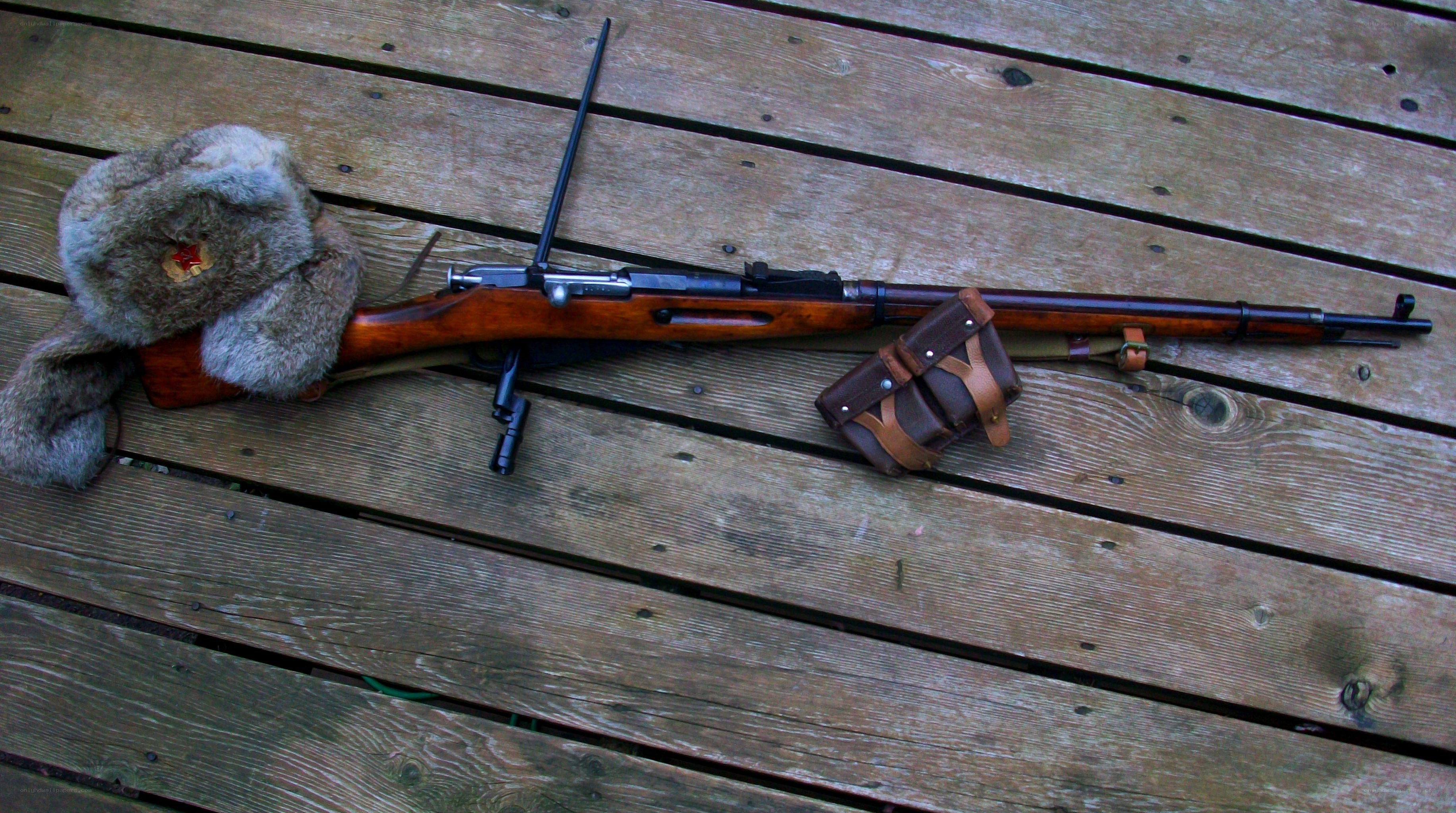 Soviet rifle with fur hat