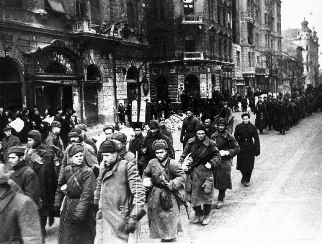Soviet soldiers in a city