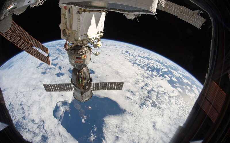 Soyuz Spacecraft Docked — Blue, Serene