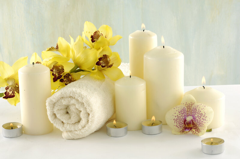 Spa arrangement with candles and orchids
