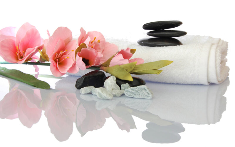 Spa arrangement with flowers and stones