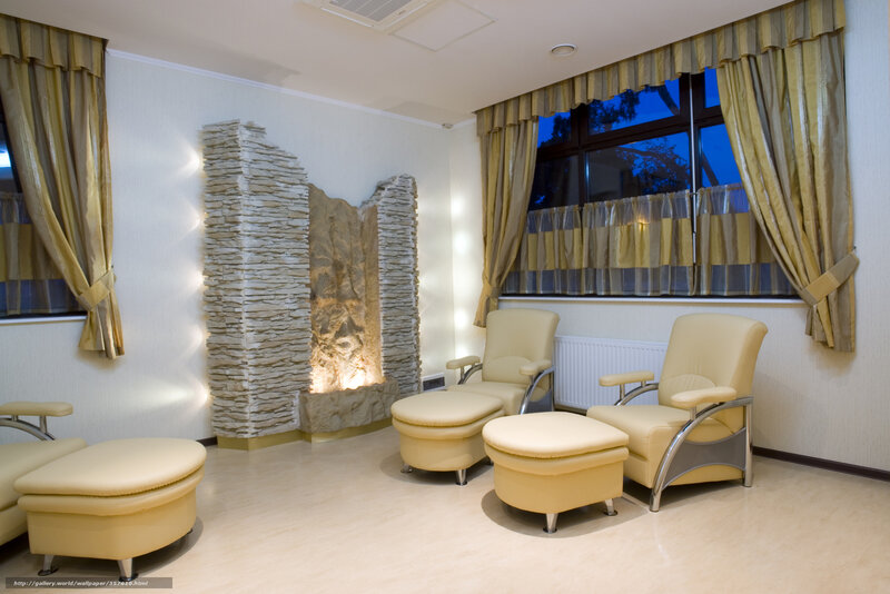 Spa lounge with stone fireplace