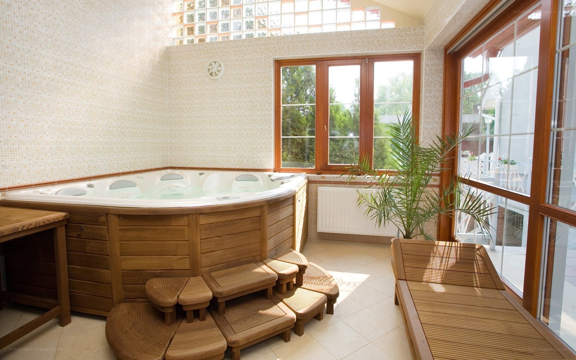 Spa room with hot tub