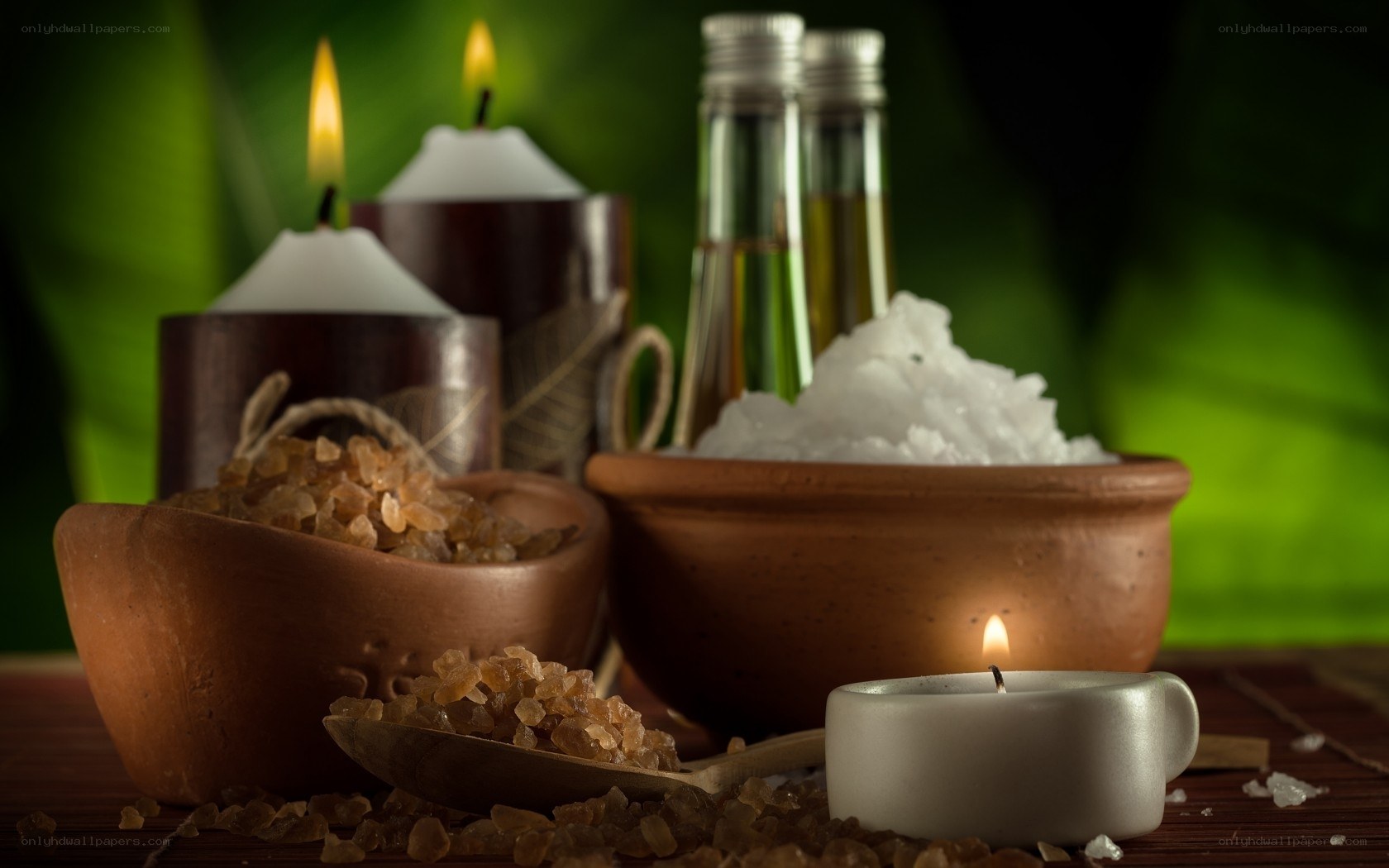 Spa setup with candles and salts
