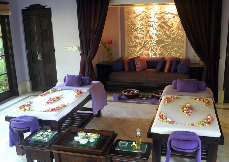 Spa treatment room with flower petals