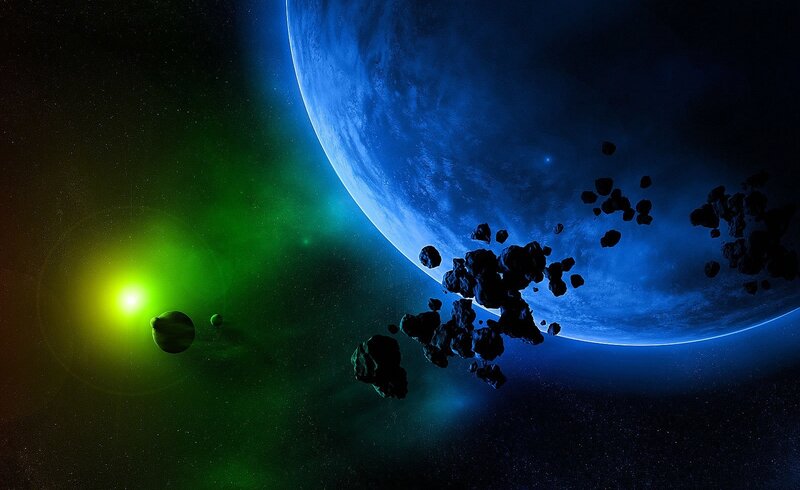 Space scene with planet and asteroids