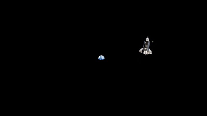 Space shuttle and Earth view