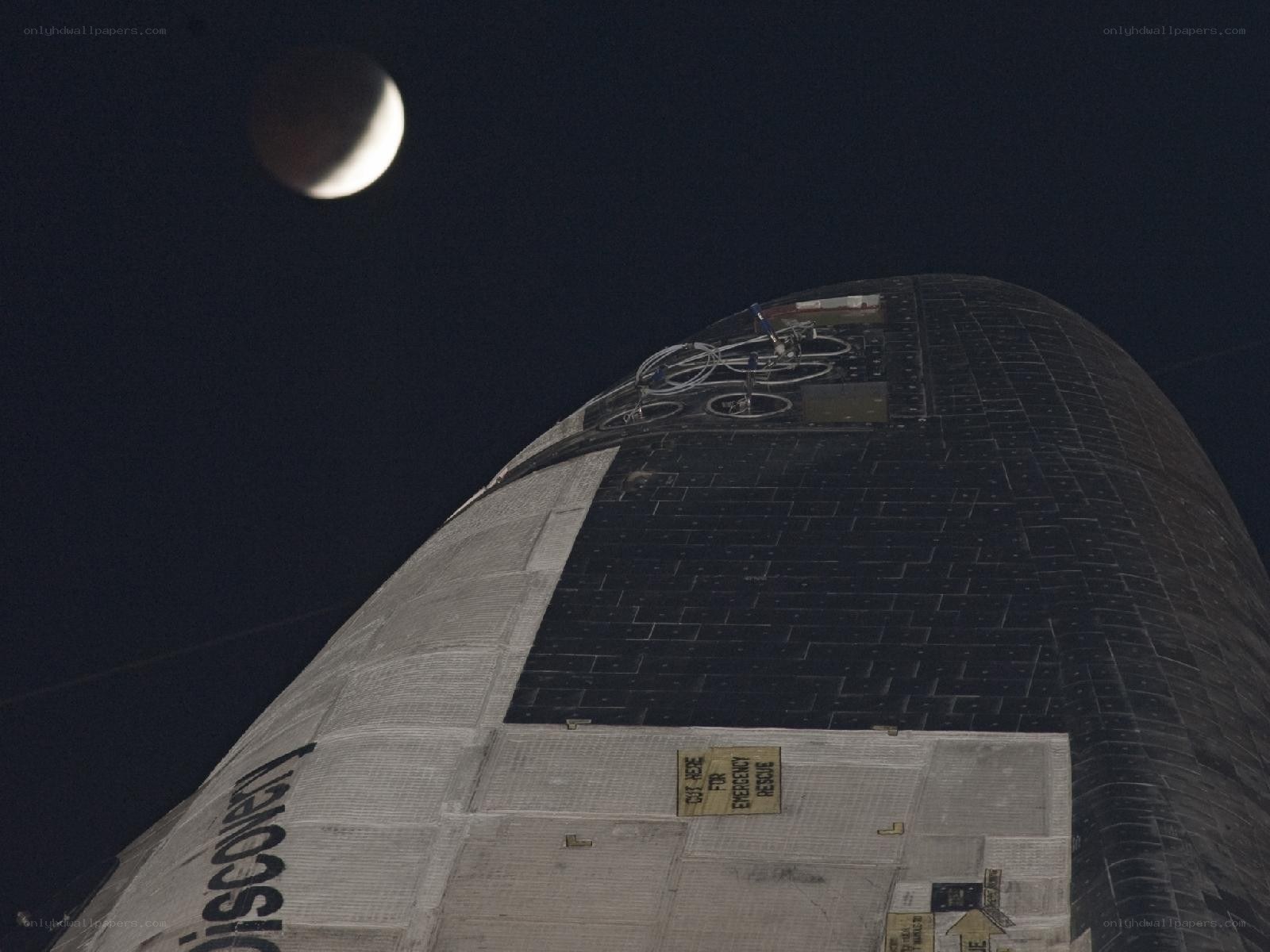 Space shuttle and moon