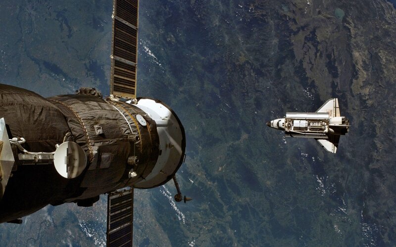 Space Shuttle and Satellite