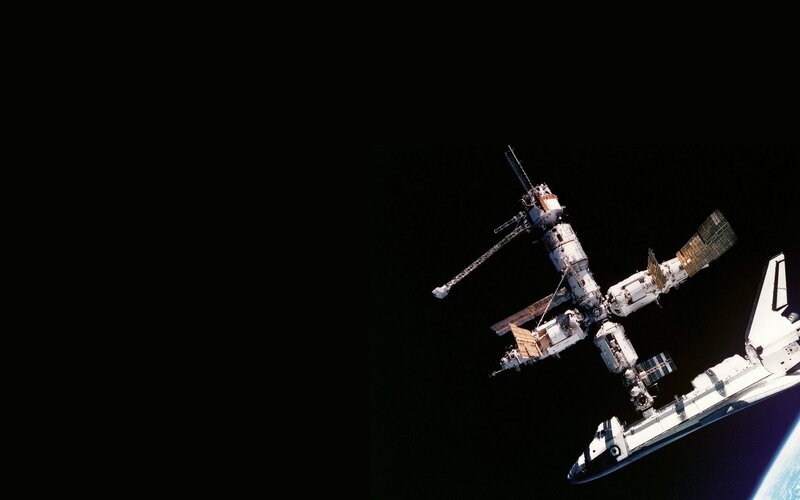 Space Shuttle and Space Station — Black, Dramatic, Photograph, Earth, Solar Panels