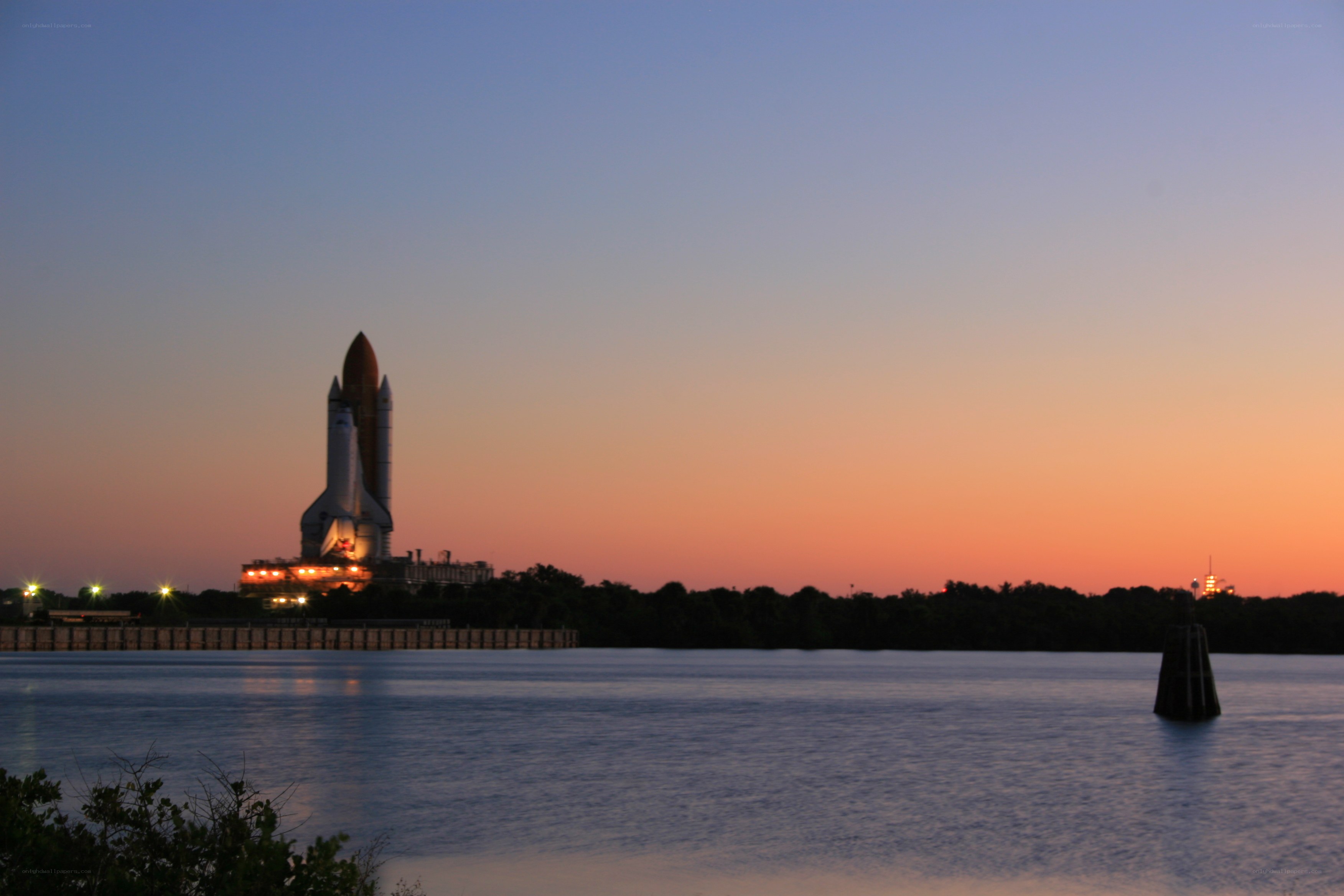 Space shuttle at sunset