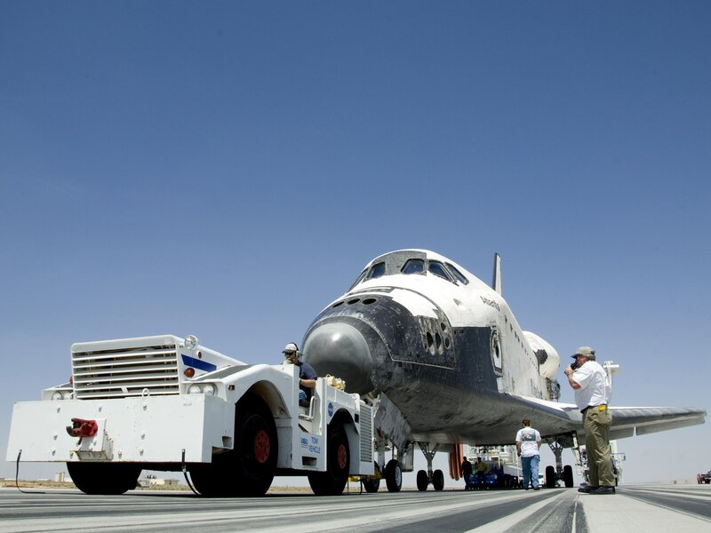 Space shuttle being towed