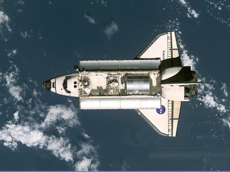 Space Shuttle Discovery — White, Serene, Photograph