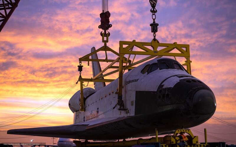 Space shuttle Endeavour being lifted