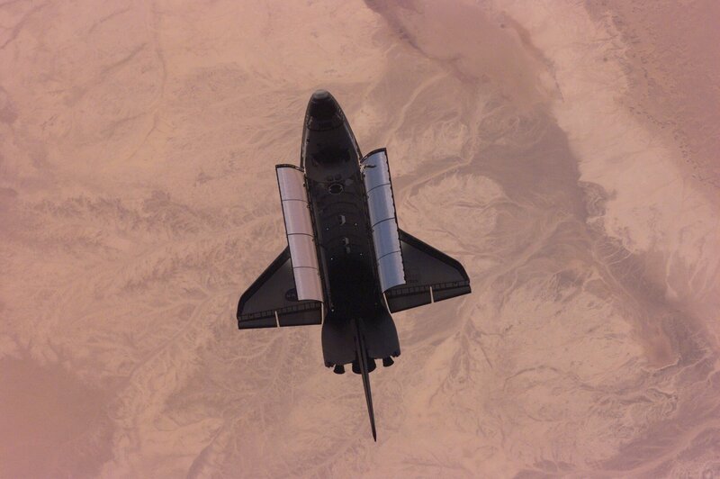 Space Shuttle in Flight — Black, Dramatic