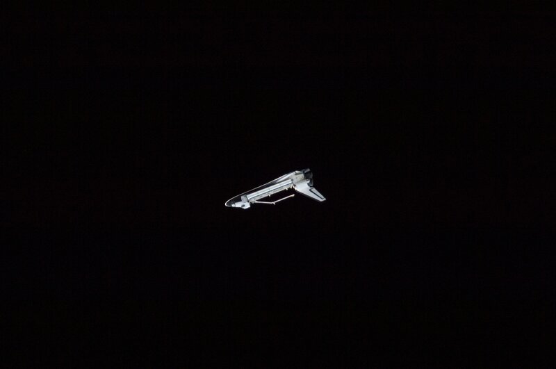 Space Shuttle in Orbit — Black, Dramatic, Night, Photograph, Spacecraft, Darkness