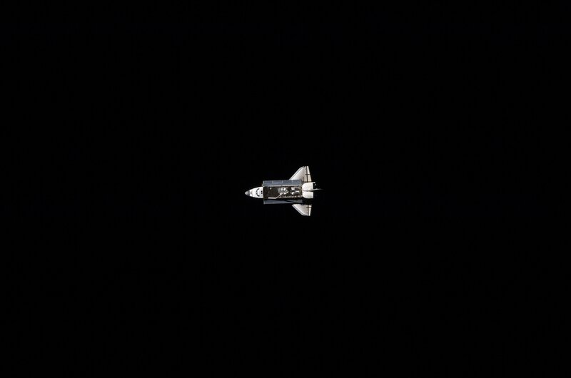 Space Shuttle in Orbit — Black, Dramatic, Night, Photograph