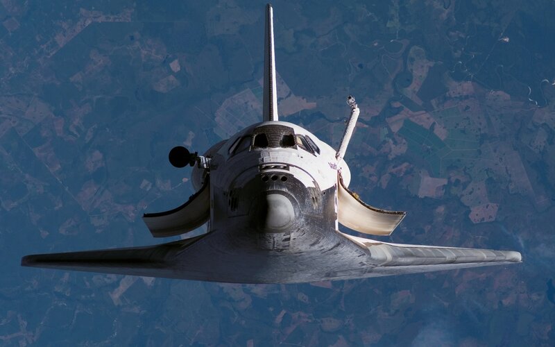 Space Shuttle in Orbit — Blue, Dramatic, Photograph, Earth, Atmosphere