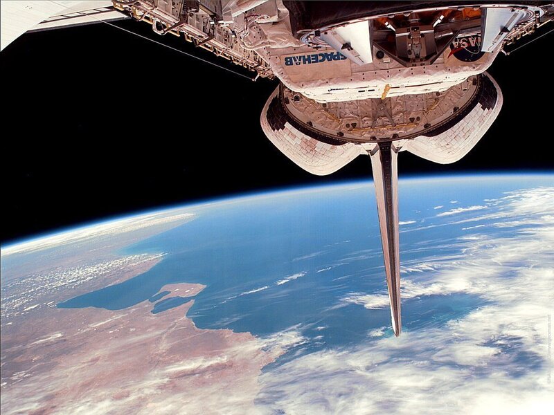 Space Shuttle in Orbit — Blue, Dramatic, Photograph, Earth, Clouds, Ocean, Land