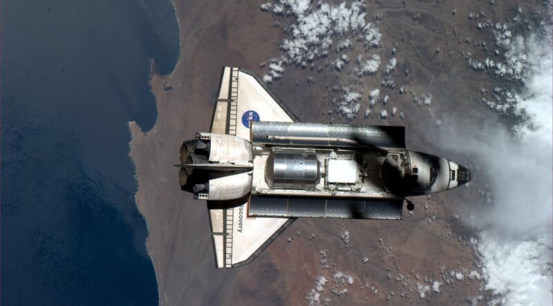 Space Shuttle in Orbit — Blue, Dramatic, Photograph, Earth, Clouds, Ocean