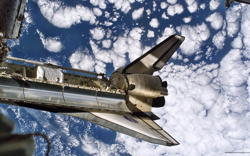 Space Shuttle in Orbit — Blue, Dramatic, Photograph, Earth, Clouds, Space Station