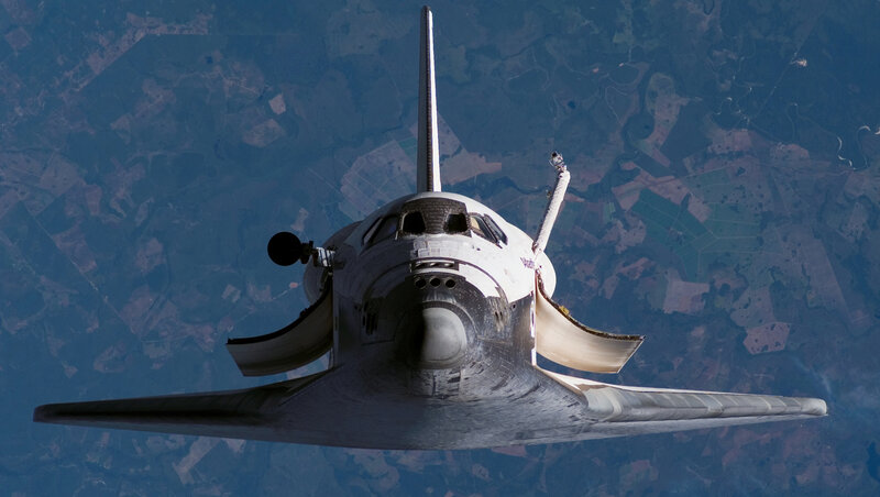 Space Shuttle in Orbit — Blue, Dramatic, Photograph, Earth, Sky