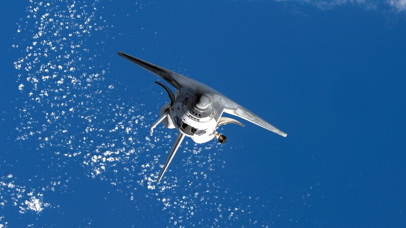 Space Shuttle in Orbit — Blue, Serene, Photograph, Earth