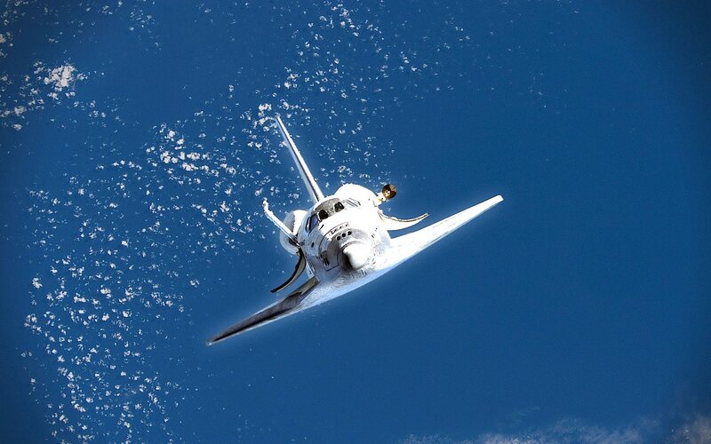 Space Shuttle in Orbit — Blue, Serene, Photograph