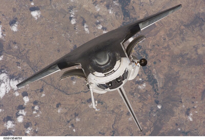 Space Shuttle in Orbit — Brown, Dramatic, Photograph, Earth, Clouds, Spacecraft
