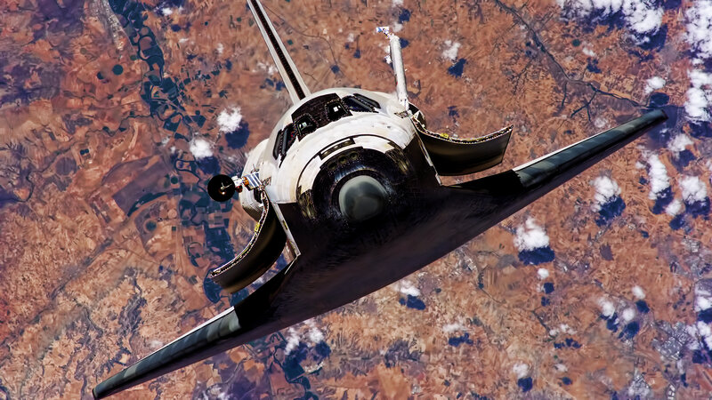 Space Shuttle in Orbit — Brown, Dramatic, Photograph, Earth