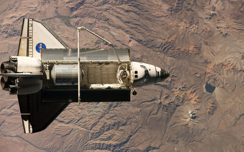 Space Shuttle in Orbit — Brown