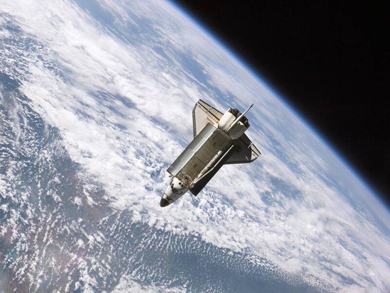 Space Shuttle in Orbit — Dramatic, Earth