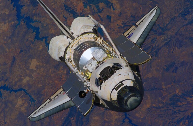 Space Shuttle in Orbit — White, Dramatic, Photograph, Earth, Launch Pad