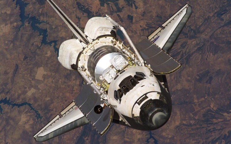 Space Shuttle in Orbit — White, Dramatic, Photograph, Earth, Launch Stack